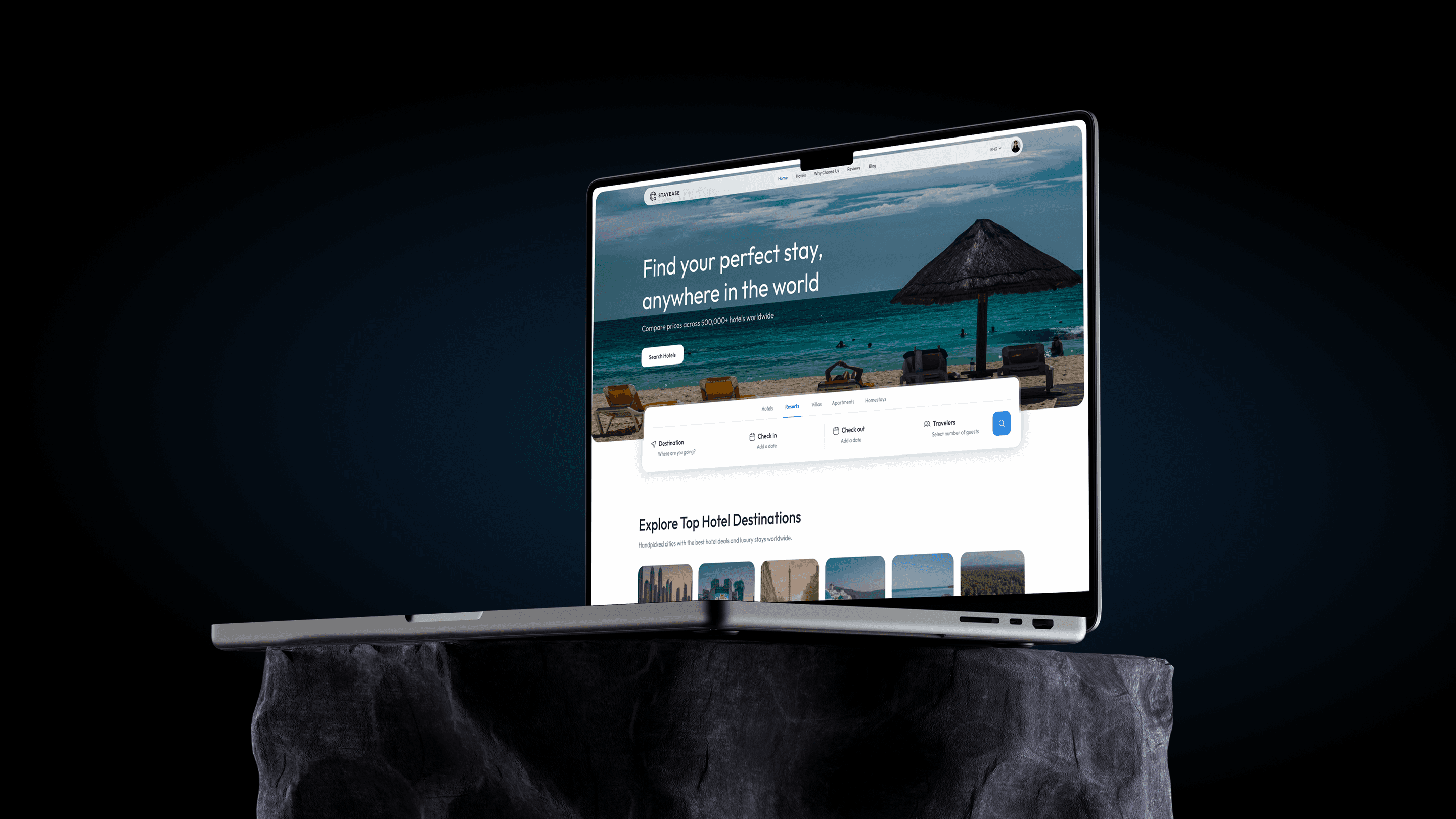 StayEase hotel booking homepage displayed on a laptop screen